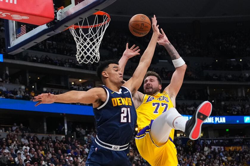 Lakers Overcome Nuggets in Thrilling Road Victory Fueled by Doncic Triple-Double